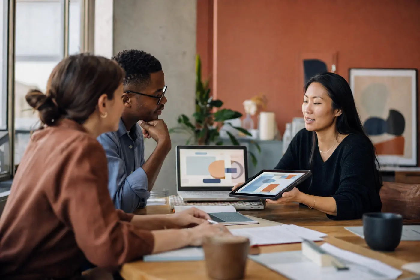 An illustrative publishing team reviewing content together